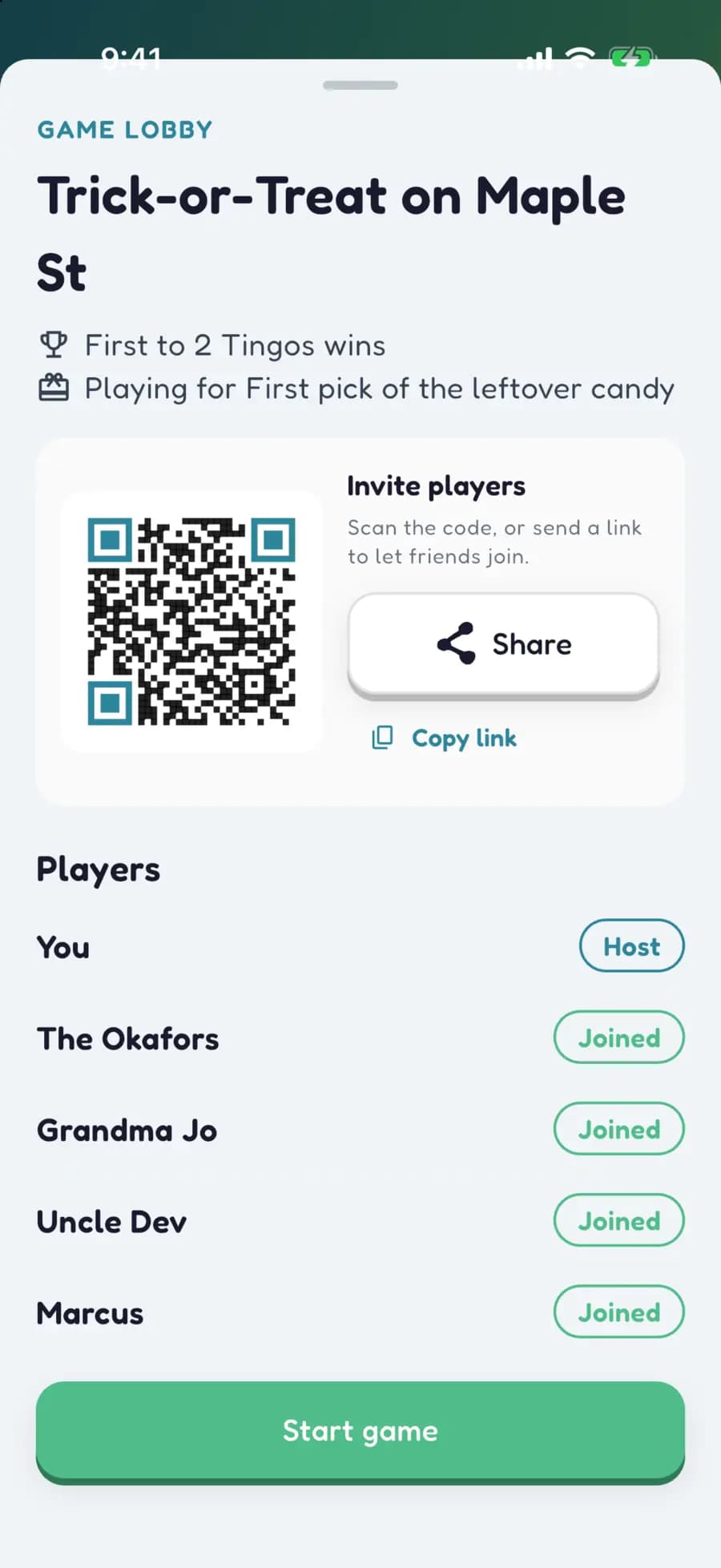 A Halloween game lobby showing a QR code to join and the players who are in.
