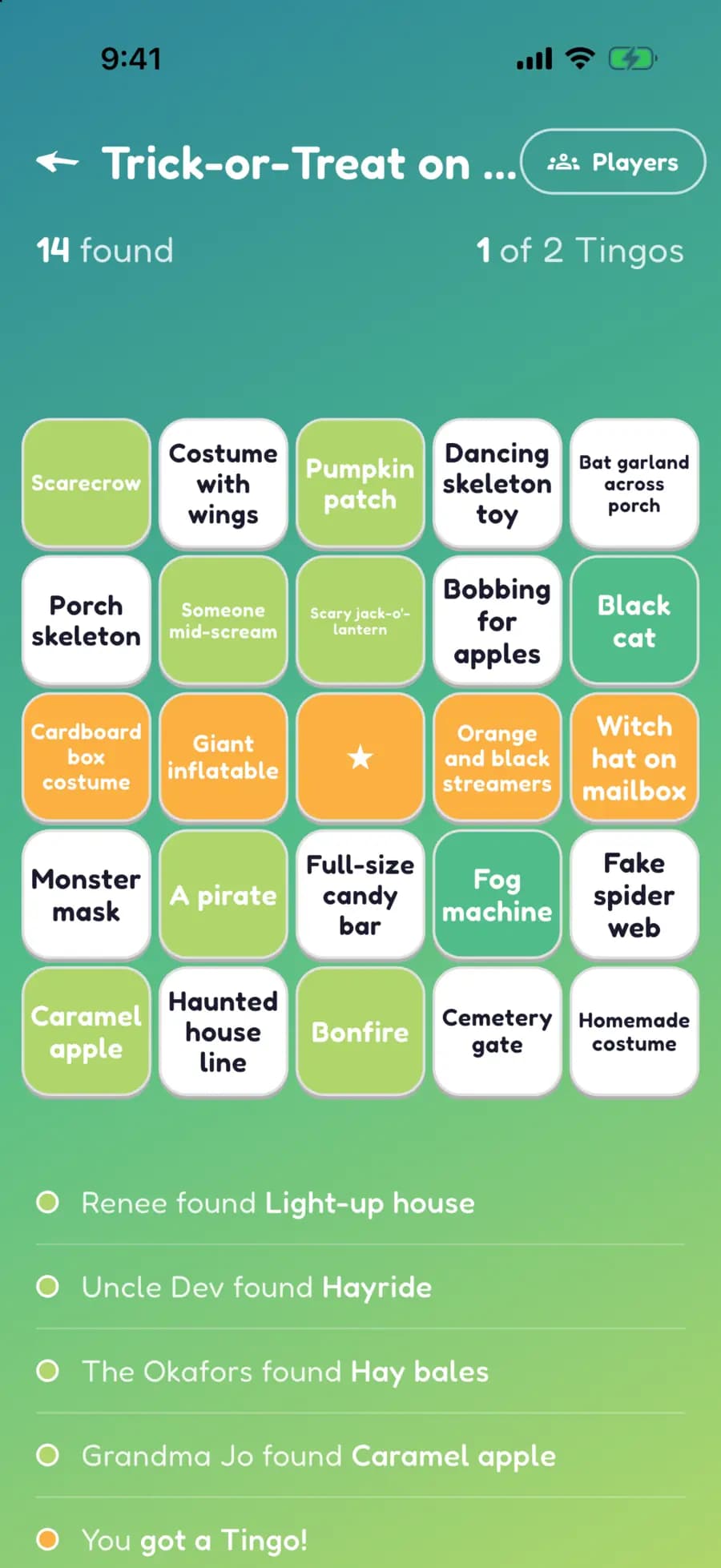 A Let's Tingo board on a phone with Halloween finds marked, one row highlighted as a completed Tingo.