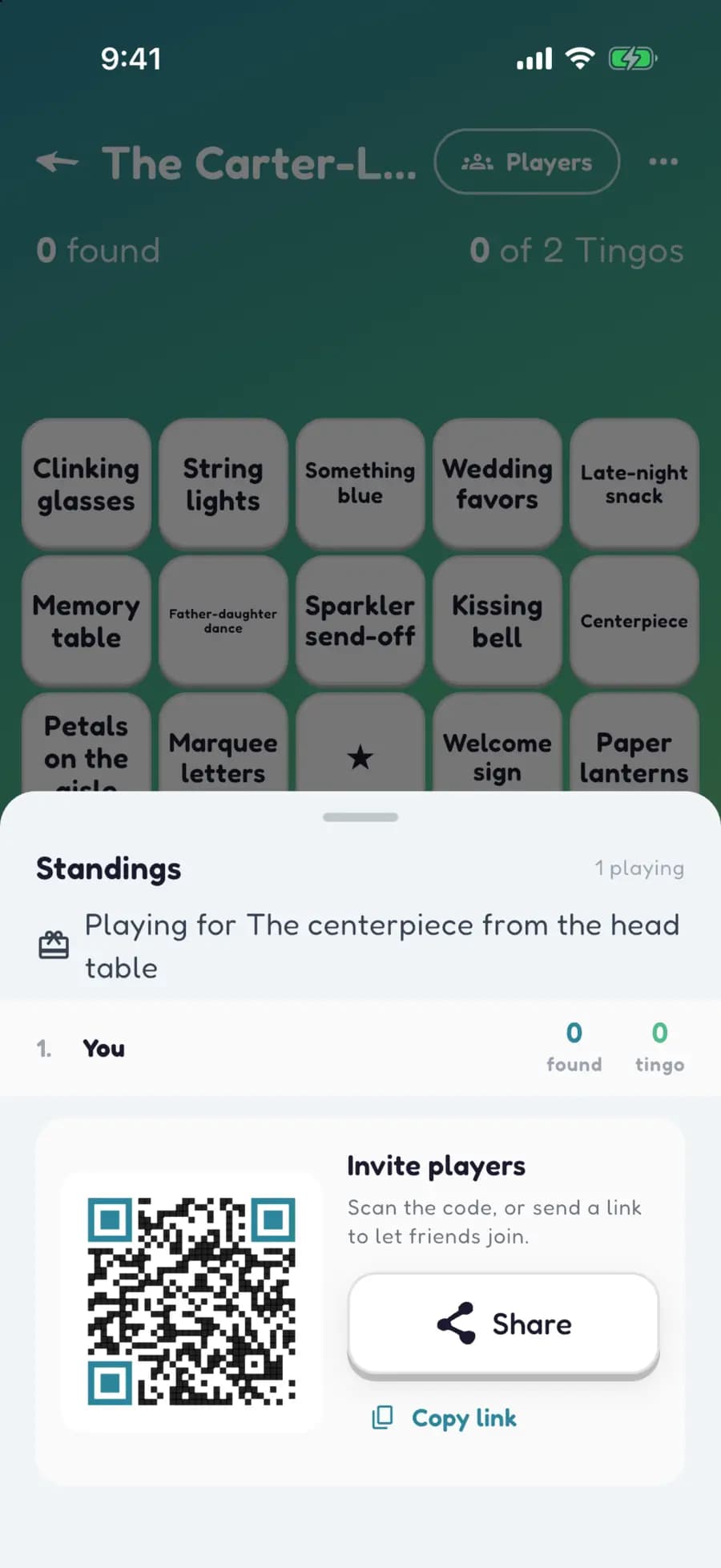 A wedding game's QR code ready to share, with the prize set to the centerpiece from the head table.
